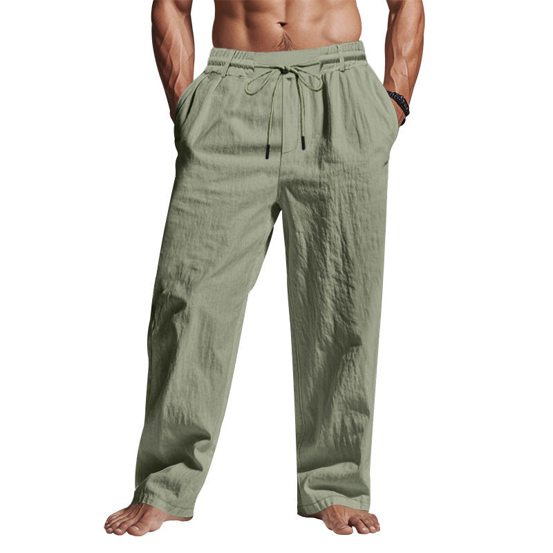 Pantaloni uomo in lino verde chiaro, elastico in vita con coulisse, tasche laterali, stile casual estivo. Ideali per look rilassato e confortevole.