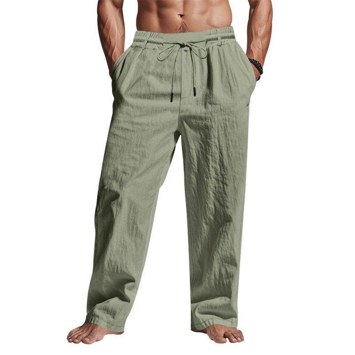 Pantaloni uomo in lino verde chiaro, stile casual, con coulisse in vita. Ideali per l&