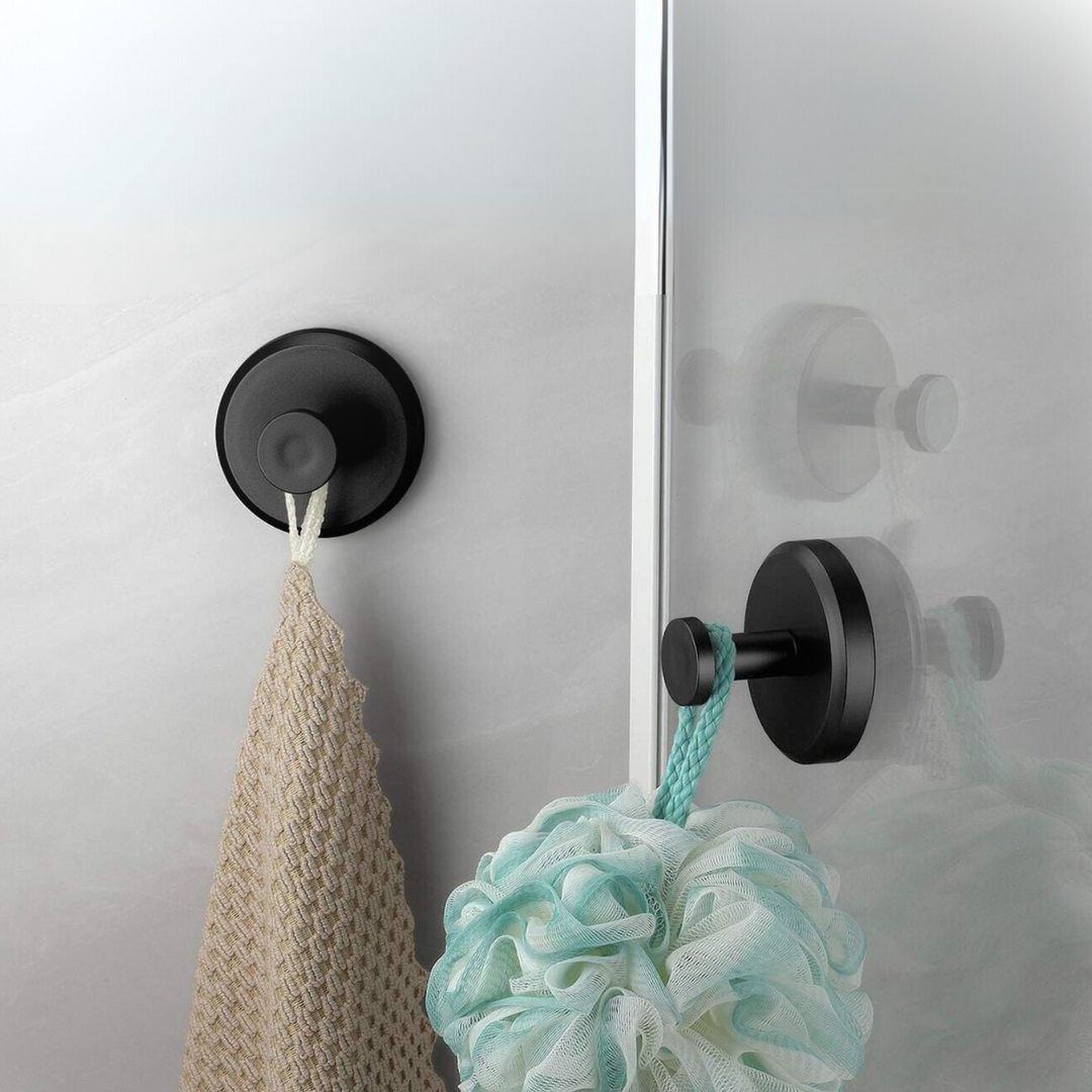 Gancio adesivo nero su vetro doccia con spugna e rete appese, accessorio bagno moderno, resistente all'acqua, facile installazione.
