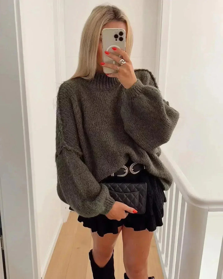 Pull ample beige pour femme avec manches ballons en maille, adapté pour des occasions décontractées.