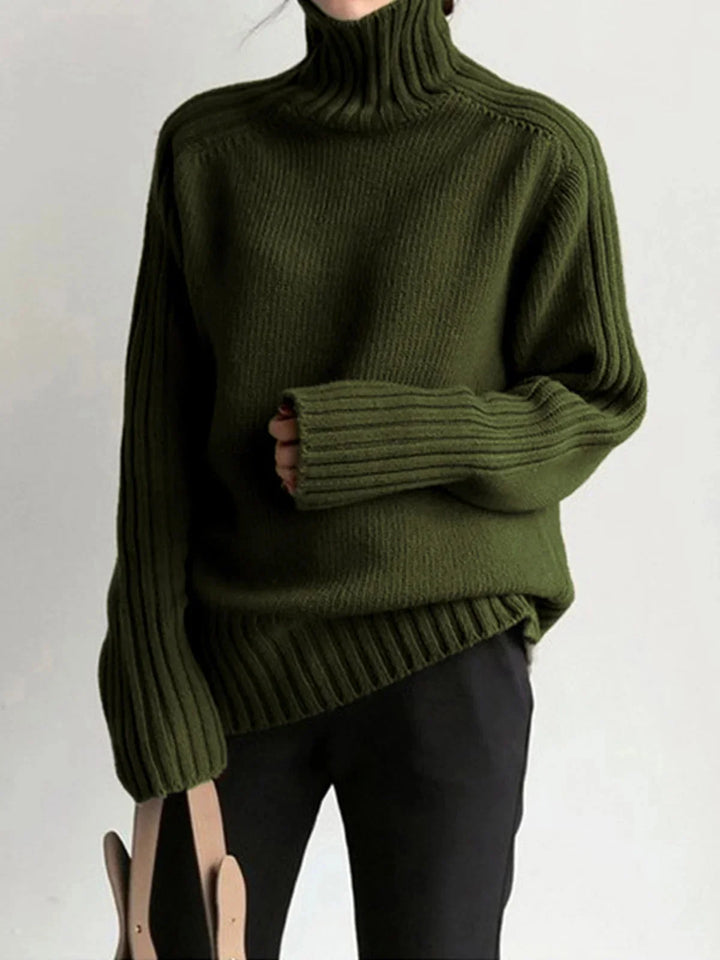 "Pull col roulé côtelé pour femme, en coton doux, manches longues, avec un design élégant et décontracté."