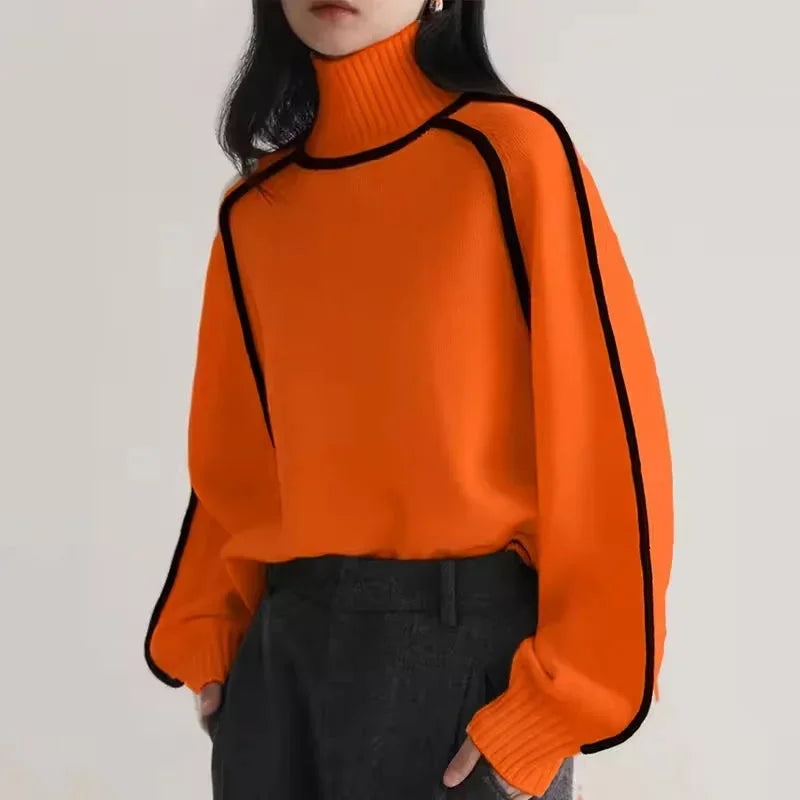 Pull col roulé femme en coton doux, avec bordure contrastée au bas et aux manches. Couleur : gris foncé.