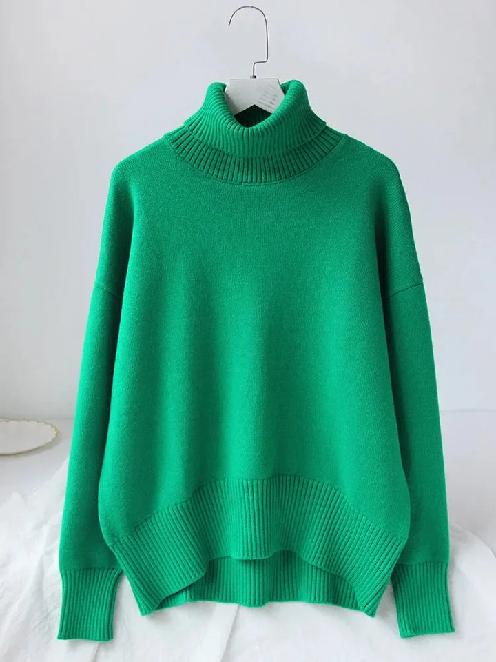 Pull col roulé femme orange, manches longues, en matière douce et respirante, adapté pour les journées fraîches.