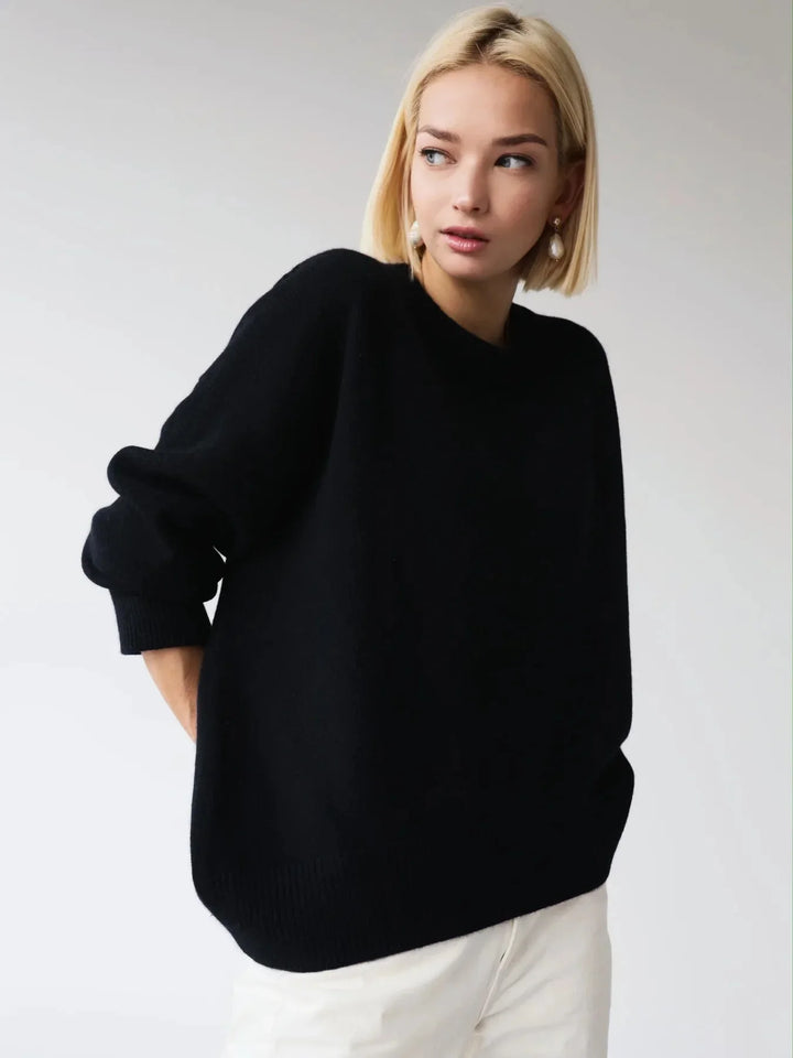 Pull femme en tricot doux, design élégant avec manches longues et col rond, parfait pour l'automne.