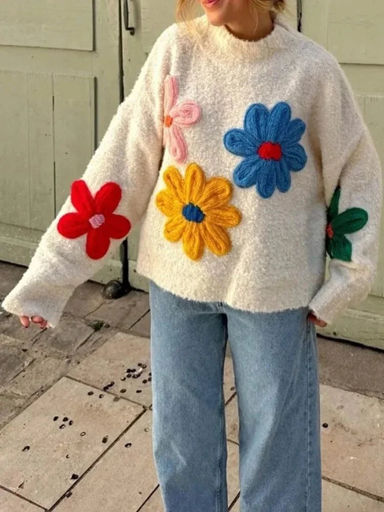 Pull femme blanc en coton avec fleurs brodées colorées, coupe classique, idéal pour le printemps.