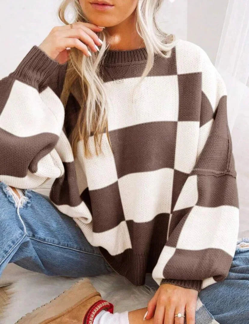 Pull femme à carreaux, en maille douce, coupe décontractée, couleur rose pâle, adapté pour le quotidien.