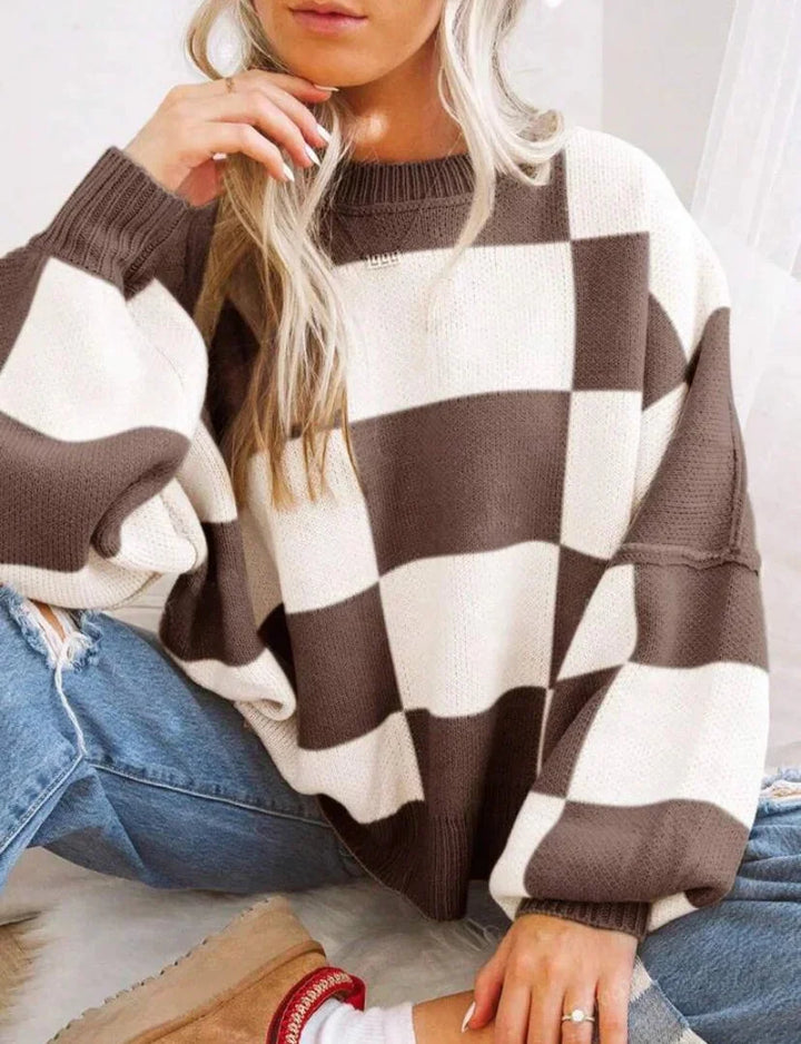 Pull femme à carreaux, en maille douce, coupe décontractée, couleur rose pâle, adapté pour le quotidien.