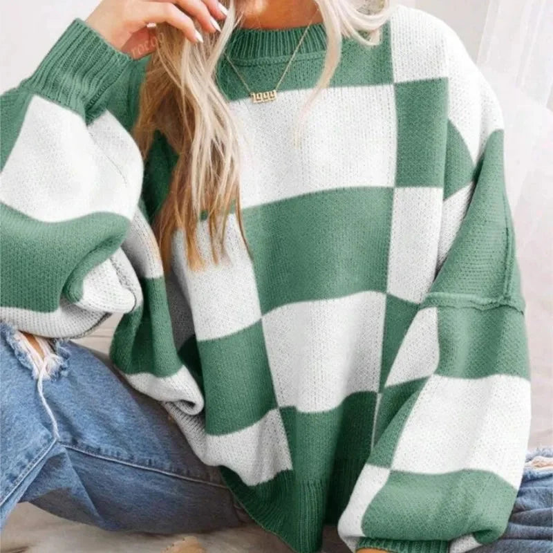 Pull femme orange à carreaux, en maille douce, coupe décontractée, adapté pour un usage toute l'année.