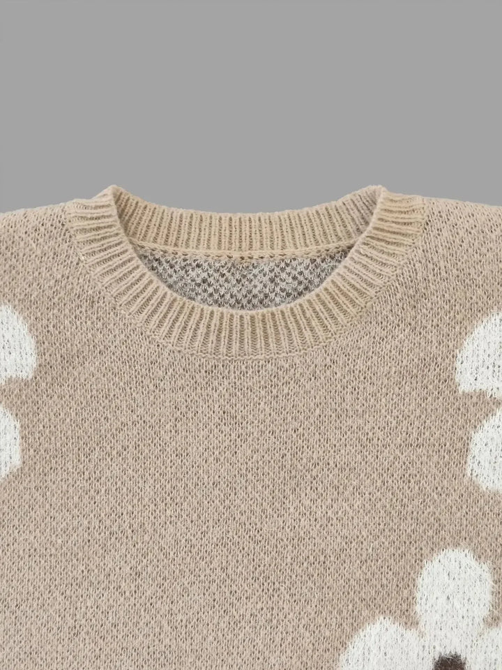 Pull femme en coton doux, col rond, motif floral aux couleurs douces.