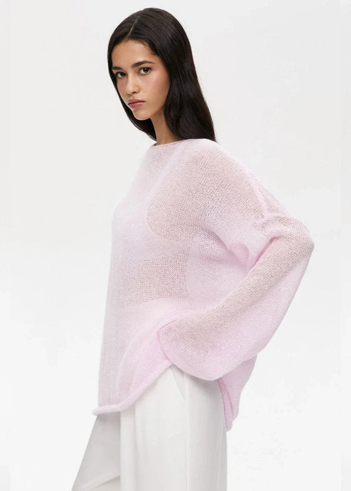 Pull femme en maille transparente beige, à manches longues et coupe moderne, parfait pour le layering.