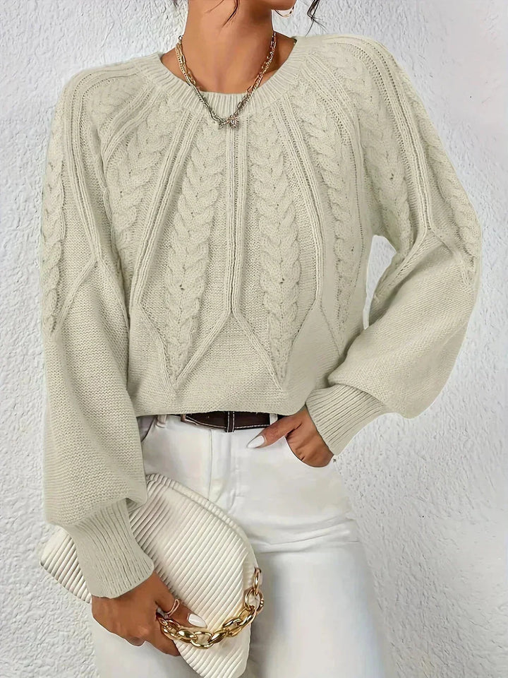 Pull femme vert clair à motif torsadé, manches longues, en mélange de coton doux.