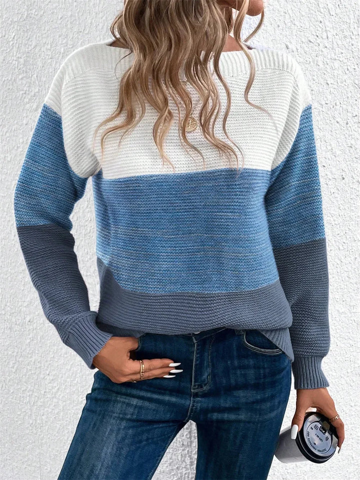 Pull femme tricolore en maille patchwork, design unique avec des couleurs vives, coupe confortable.