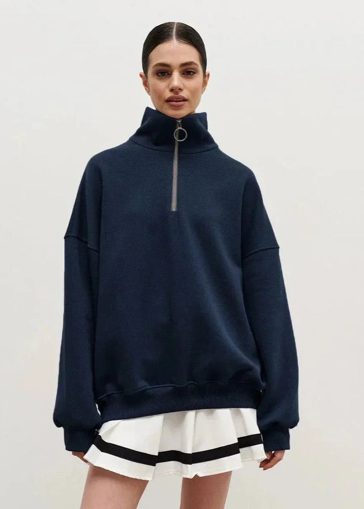 Pull à fermeture éclair gris, coupe décontractée, en mélange de coton, adapté pour les activités de loisirs.