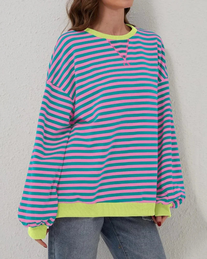 Pull rayé oversize femme en mélange de coton, couleur rose, conçu pour un style décontracté au quotidien.