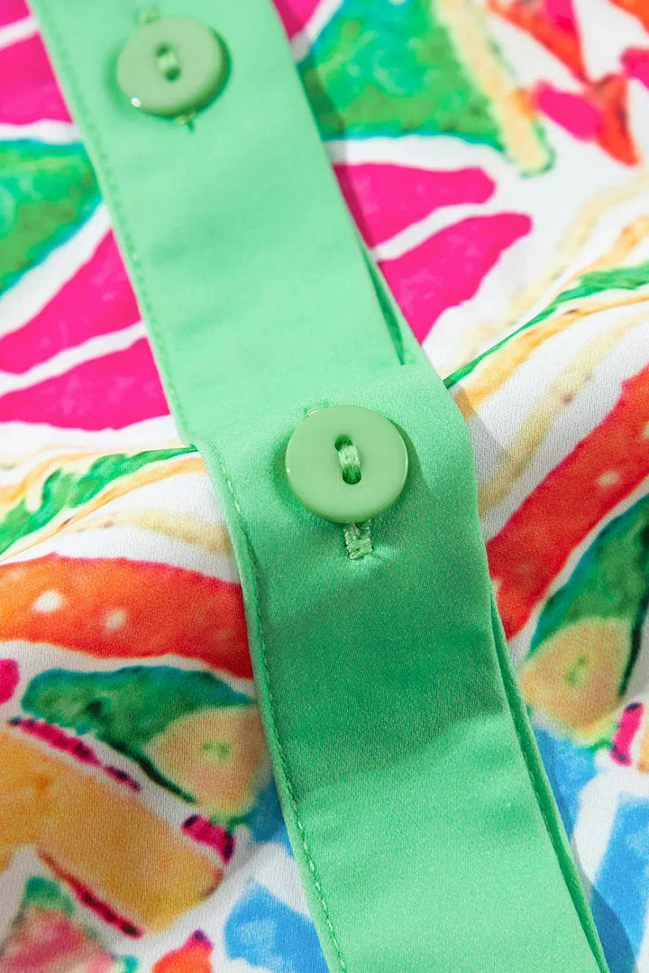 Robe chemise bohème colorée avec imprimé floral, boutonnage avant, et manches courtes pour les journées d'été.