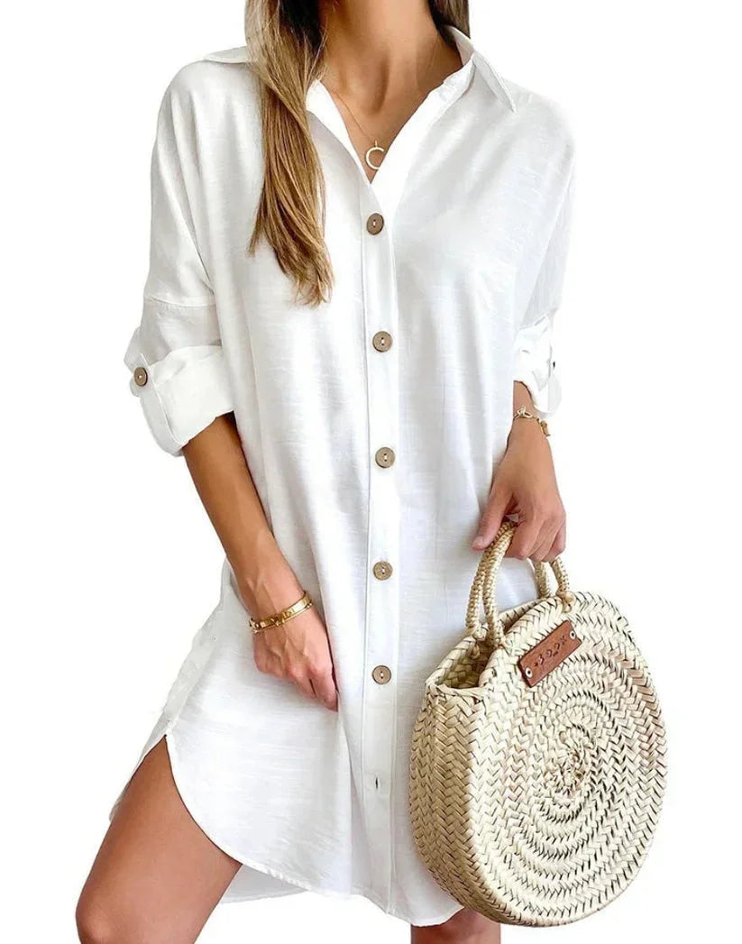 Robe chemise mini boutonnée, col classique, manches longues, en tissu léger, idéale pour un look quotidien décontracté.