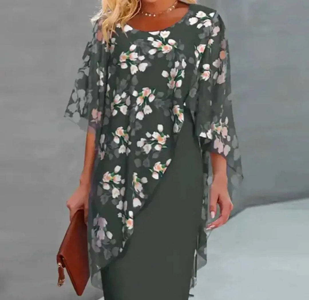 Robe courte transparente avec imprimé floral, manches chauve-souris et superposition légère, idéale pour les journées…