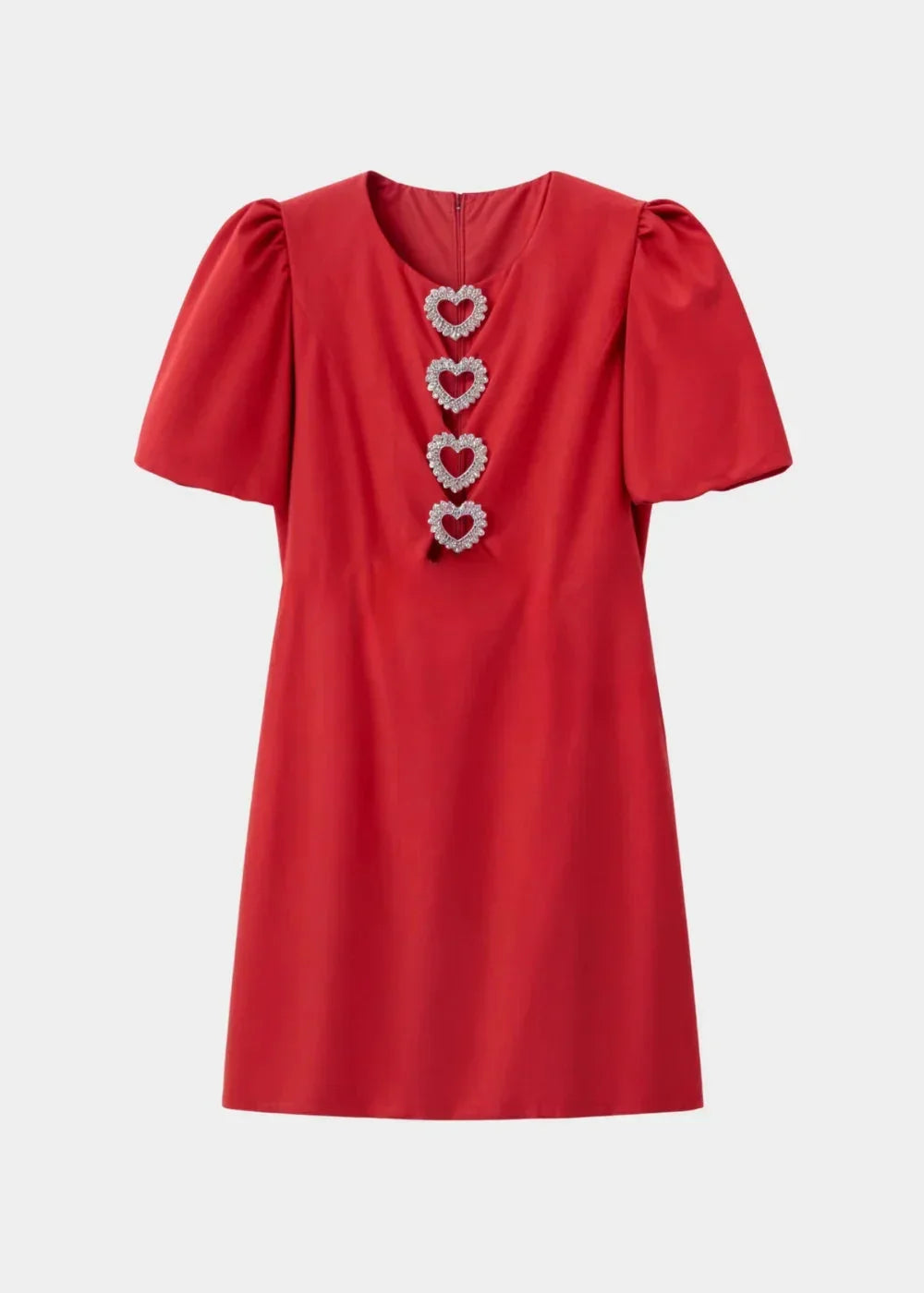 Robe courte à pois avec nœuds, manches bouffantes, en tissu léger idéal pour une soirée, offrant une allure féminine et chic.