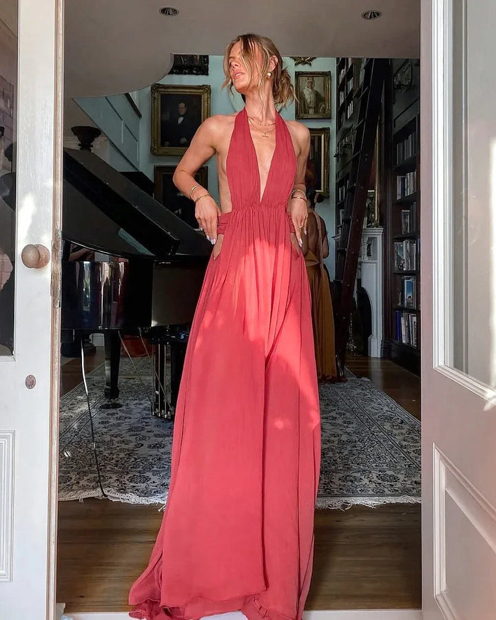 Robe d'été femme dos nu en coton léger, avec imprimé floral et long dos dénudé pour une silhouette aérienne et estivale.
