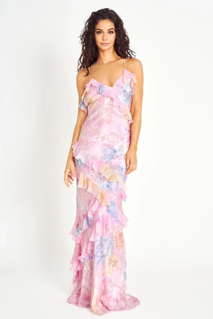 Robe longue femme à volants, en coton léger, avec des motifs floraux et une coupe fluide pour un confort optimal.