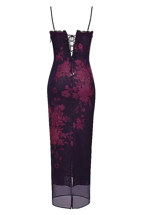 Robe longue femme en tissu léger, à bretelles ajustables et motifs floraux colorés pour un style décontracté.