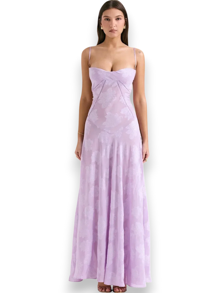 Robe longue en coton avec broderie florale délicate et bretelles fines, idéale pour les journées d'été décontractées.