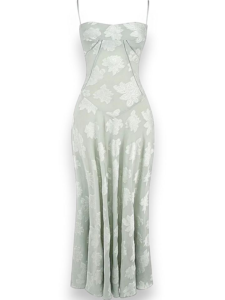 Robe longue femme en coton, ornée de broderies florales délicates, avec des bretelles fines pour une allure élégante.
