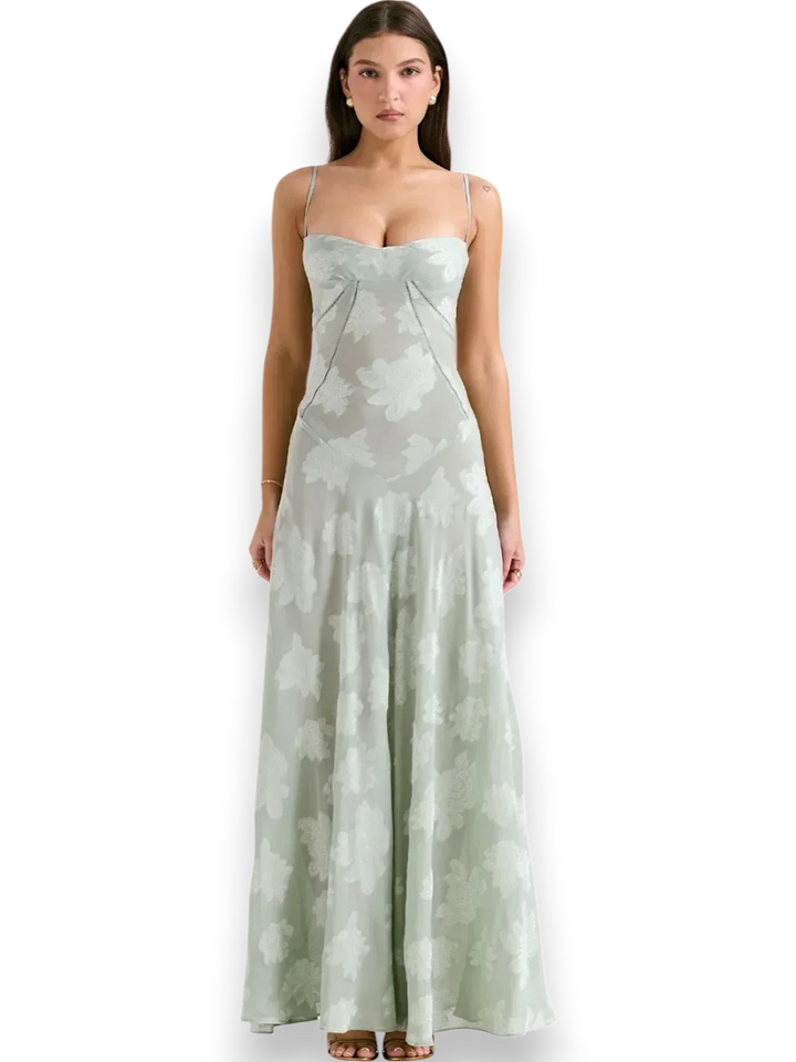 Robe longue femme en coton, ornée de broderies florales colorées et dotée de bretelles fines pour un style délicat.