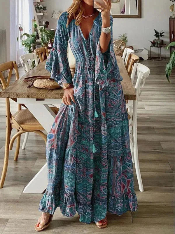 Robe longue bleu pour femme, style bohème, à manches évasées, imprimée, idéale pour l'été, en tissu léger et fluide.