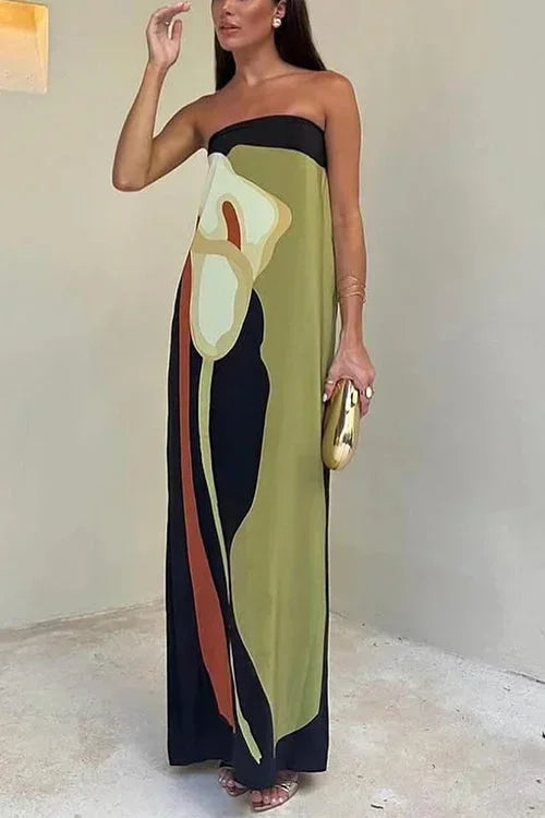 Robe longue femme bustier aux motifs abstraits, en tissu fluide, dotée d'un décolleté élégant et d'une coupe moderne.