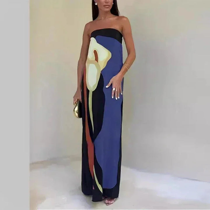 Robe longue bleue femme bustier, en tissu fluide avec motifs abstraits, idéale pour un look décontracté et élégant.