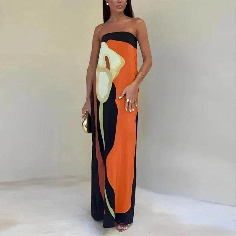Robe longue orange femme bustier avec motifs abstraits, en tissu fluide pour un confort optimal et un style élégant.