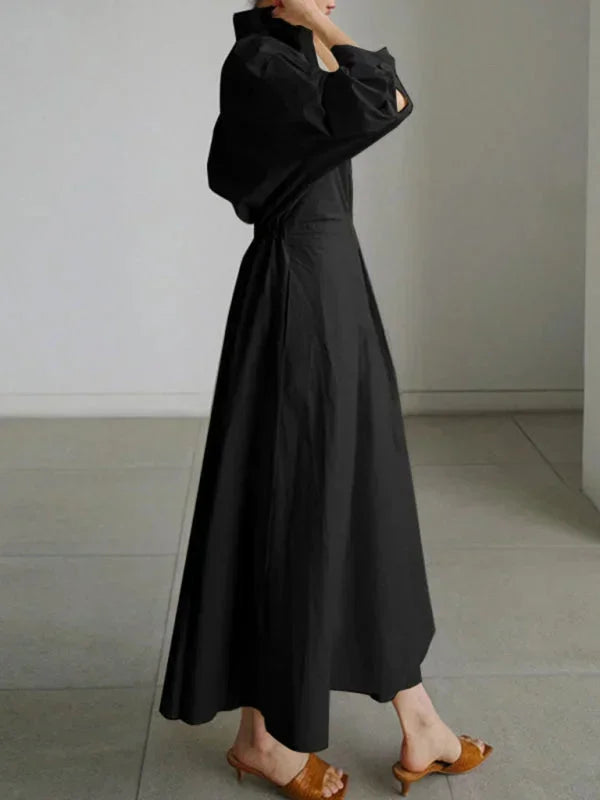 Robe longue femme en coton léger, col fluide, manches courtes, avec poches pratiques et élastique à la taille.