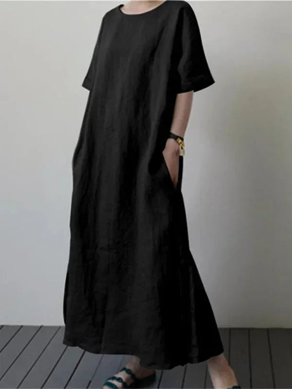 Robe longue femme en coton, col rond, avec ceinture ajustable pour un ajustement personnalisé et un look élégant.