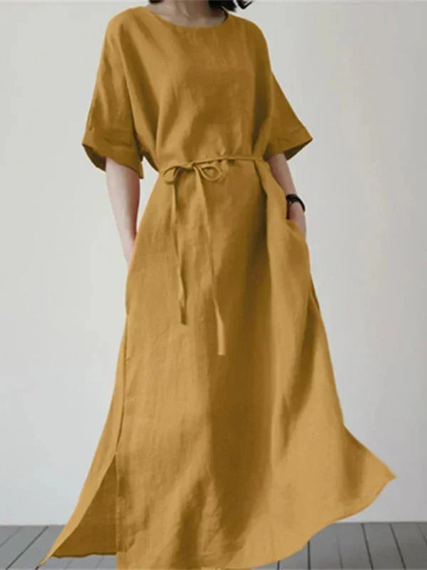 Robe longue en jersey jaune pour femme, col rond, avec ceinture ajustable et coupe fluide, idéale pour les journées d'été.
