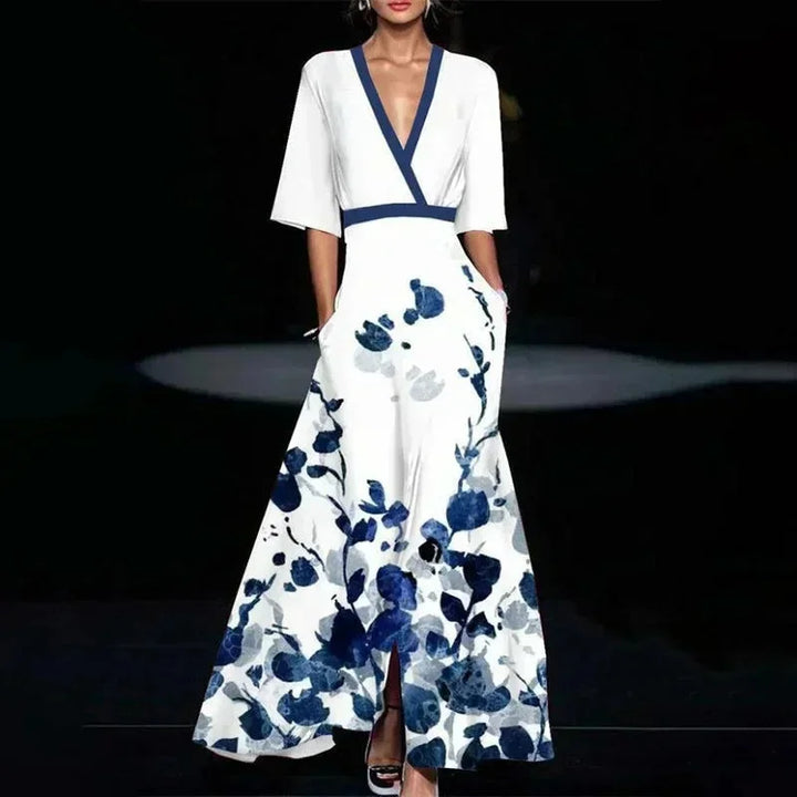 Robe longue femme en coton, col V, imprimée de fleurs colorées, avec ceinture assortie pour cintrer la taille.