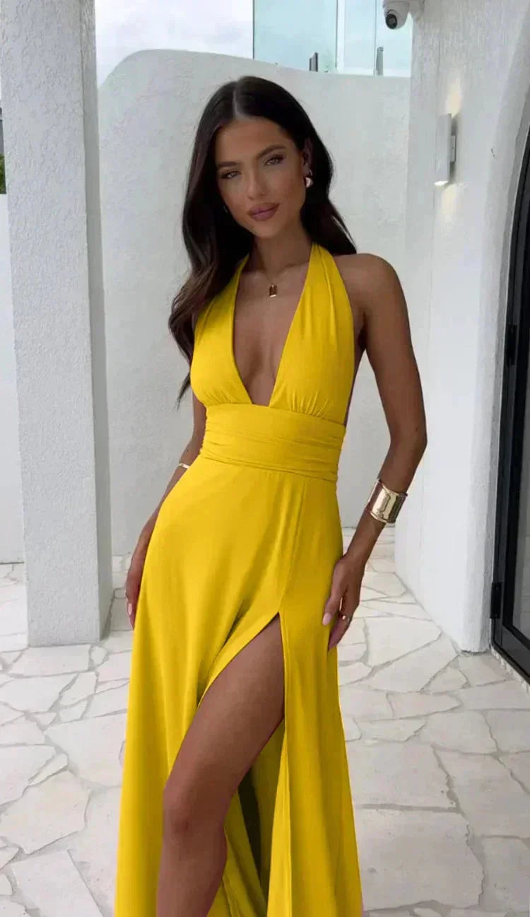 Robe longue jaune pour femme, en tissu léger, encolure plongeante, fente élégante pour un style sophistiqué et confortable.