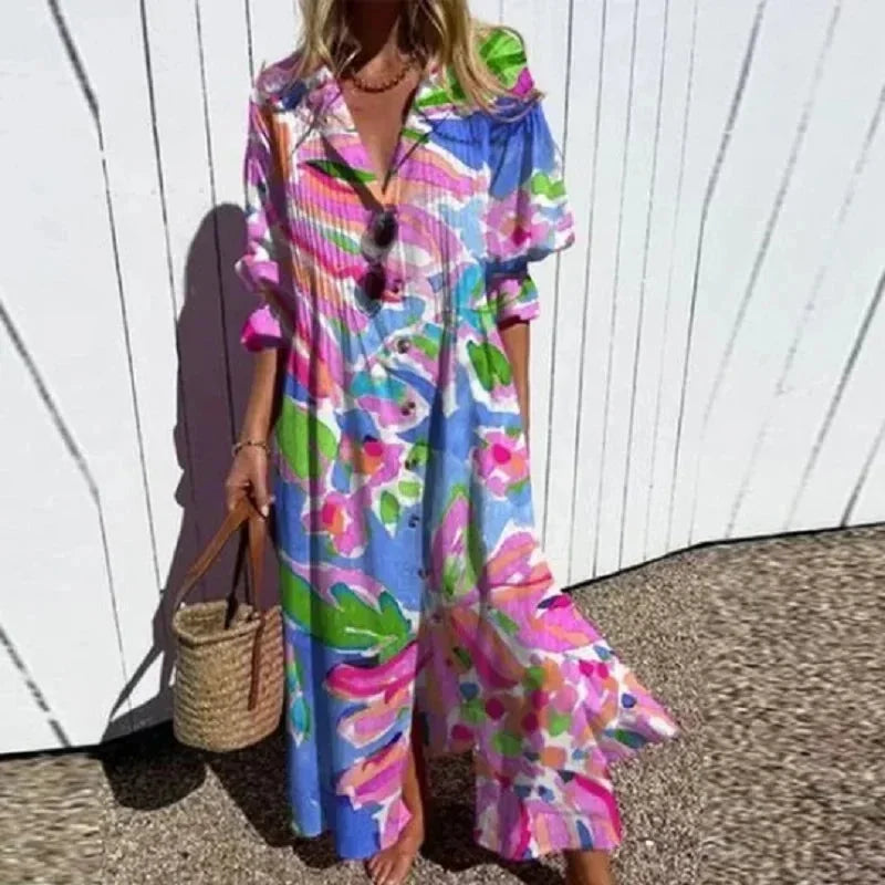 Robe longue rose à imprimé floral, col V, manches mi-longues, confectionnée en tissu léger et respirant.