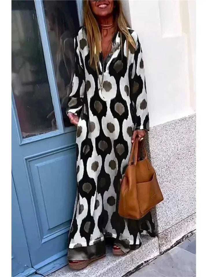 Robe longue femme à manches longues avec imprimé floral et col V, en tissu fluide pour un confort optimal.