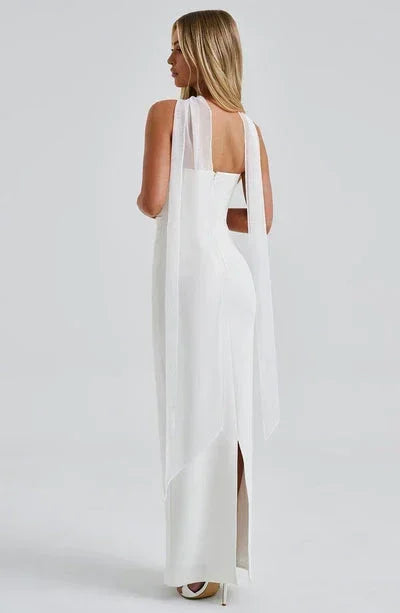 Robe longue femme moulante en jersey stretch, avec un décolleté rond et des manches courtes, idéale pour les occasions…