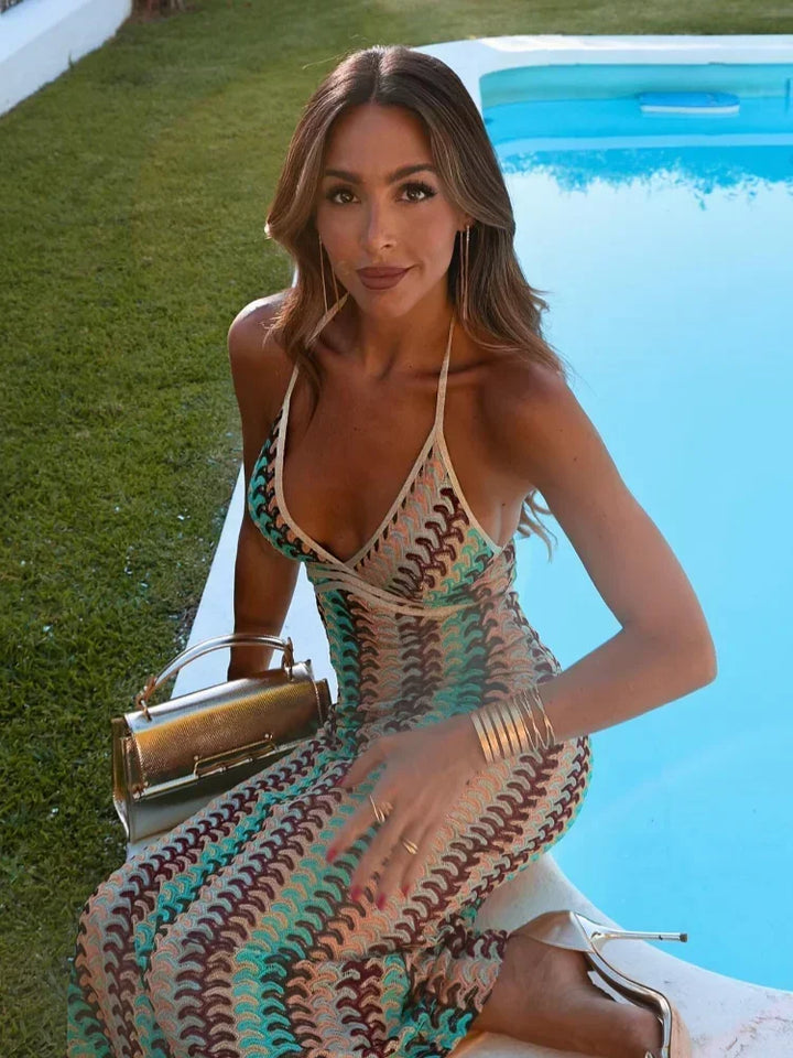 Robe longue femme multicolore à bretelles, en coton léger, imprimé floral avec une coupe fluide et élégante.