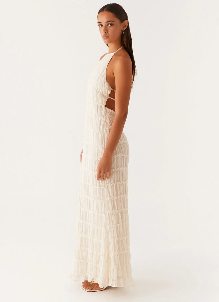 Robe longue noire à bretelles, en coton léger, coupe fluide, parfaite pour les journées d'été.