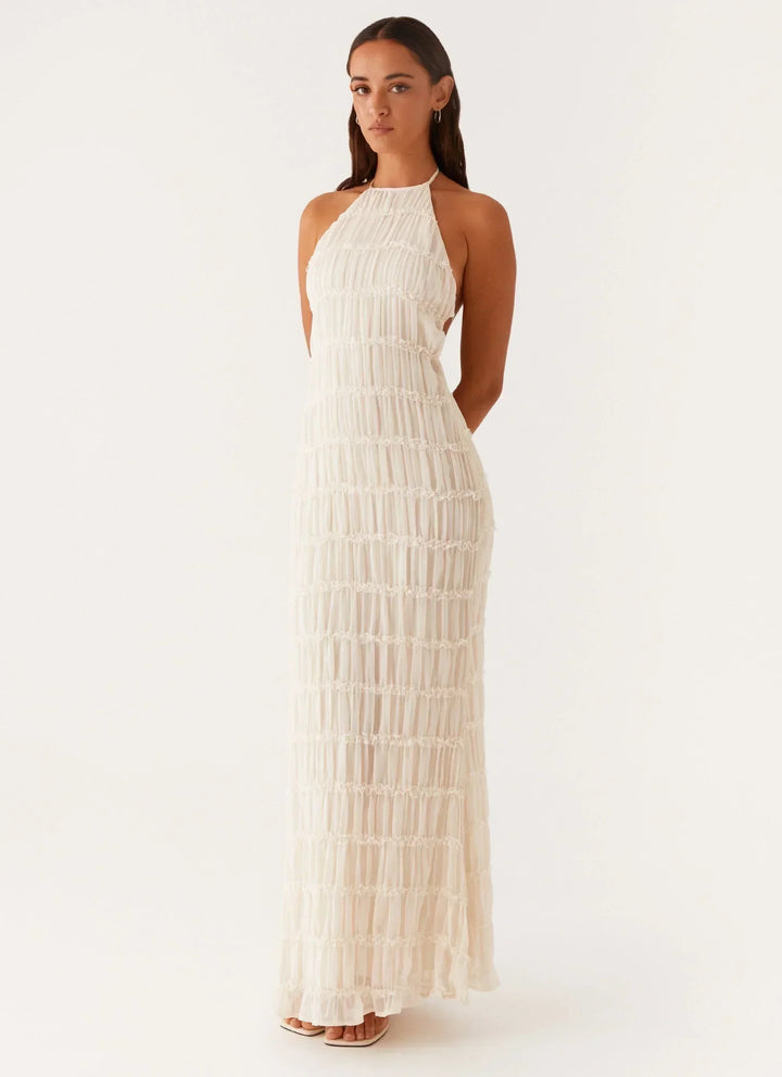 Robe longue noire à bretelles, en coton léger, avec un design fluide et décontracté, parfaite pour les journées d'été.