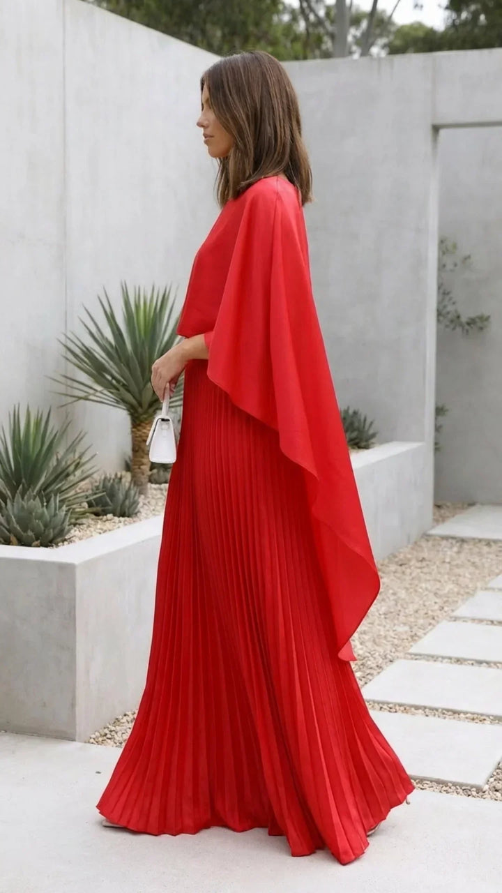 Robe longue pour femme, plissee, manches cape, en tissu léger, offrant une silhouette élégante et fluide.
