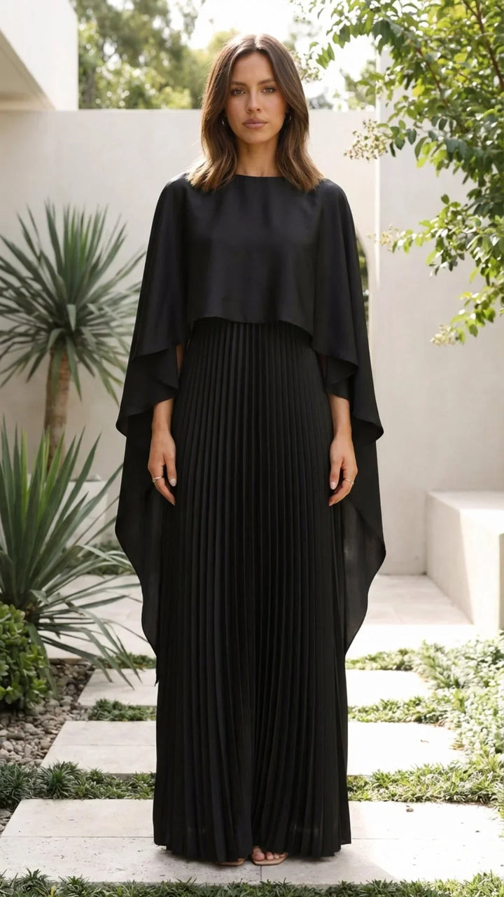 Robe longue femme plissee noire avec manches cape, en tissu léger et fluide, parfaite pour une allure élégante et…