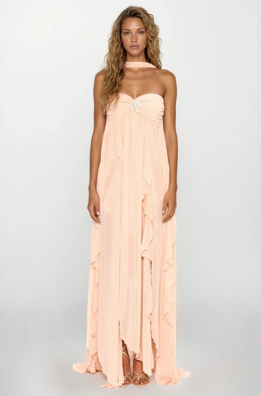 Robe longue femme rose volantée en coton léger, avec des volants délicats et une coupe fluide pour un look bohème.