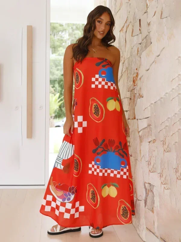 Robe longue sans bretelles en coton léger, motifs floraux estivaux, idéale pour les journées ensoleillées.
