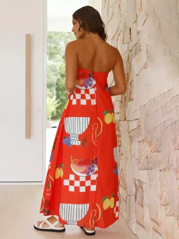 Robe longue femme sans bretelles en tissu léger, motifs floraux estivaux, idéale pour les journées chaudes.