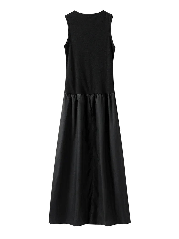 Robe longue femme sans manches en polyester, avec jupe évasée, couleur noir, parfaite pour les occasions estivales.