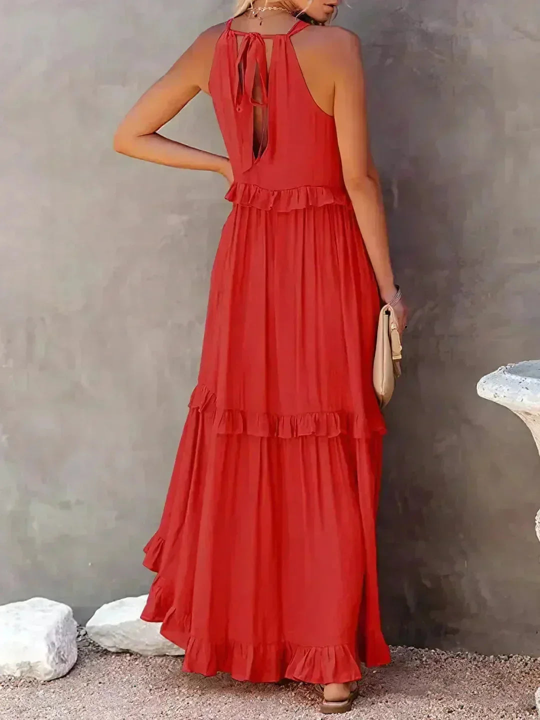 Robe longue femme sans manches en coton, avec volants superposés et un design fluide pour un look élégant et confortable.